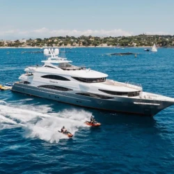 Luxury exterior view of Champagne Seas Trinity yacht anchored in The Bahamas