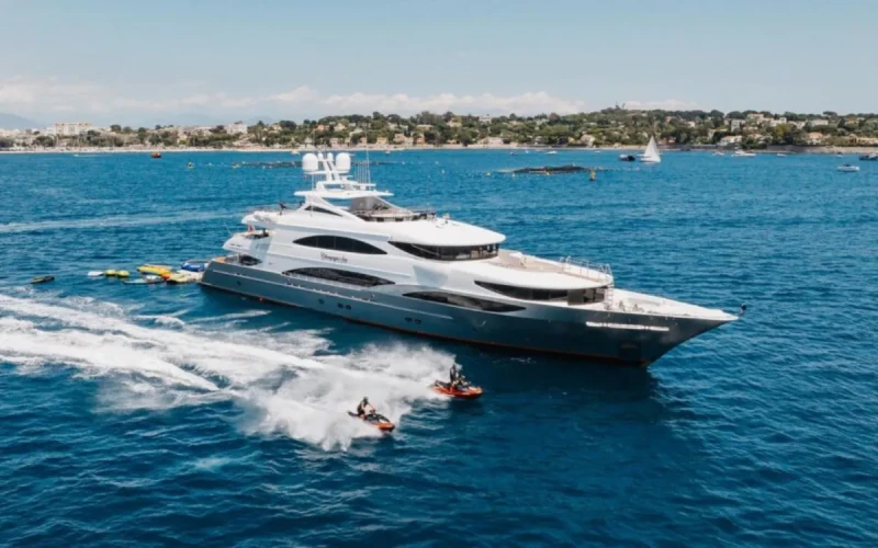 Luxury exterior view of Champagne Seas Trinity yacht anchored in The Bahamas