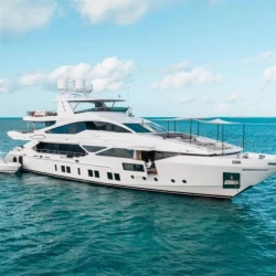 EMINA yacht charter cruising through the crystal-clear waters of The Bahamas