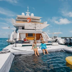 EMINA yacht charter cruising through the crystal-clear waters of The Bahamas