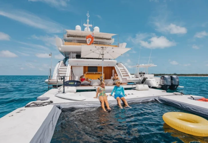 EMINA yacht charter cruising through the crystal-clear waters of The Bahamas