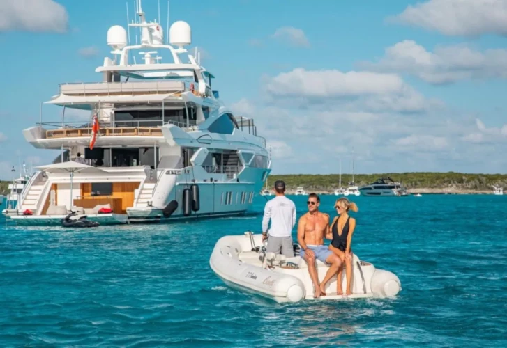 EMINA yacht charter cruising through the crystal-clear waters of The Bahamas